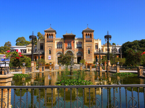An ornamental lake in the gardens of the Alcazar Palace in Seville, Spain.