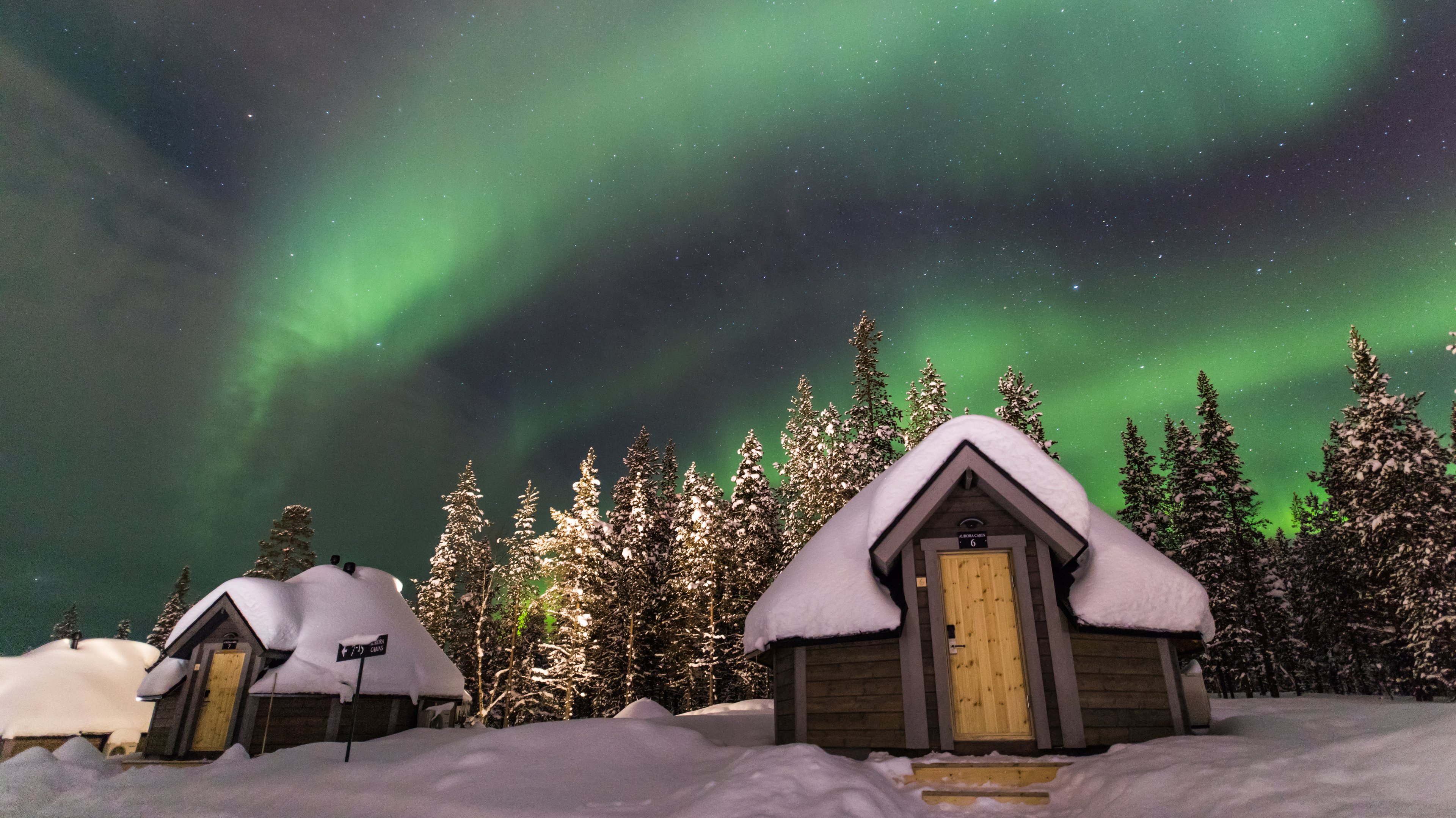 Snowy igloo in Finnish Lapland, a magical spot for Northern Lights Finland