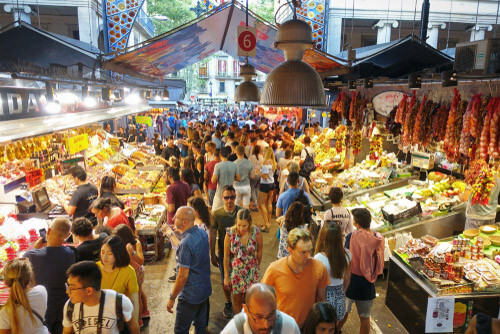 The bustling La Boqueria Market in Barcelona.