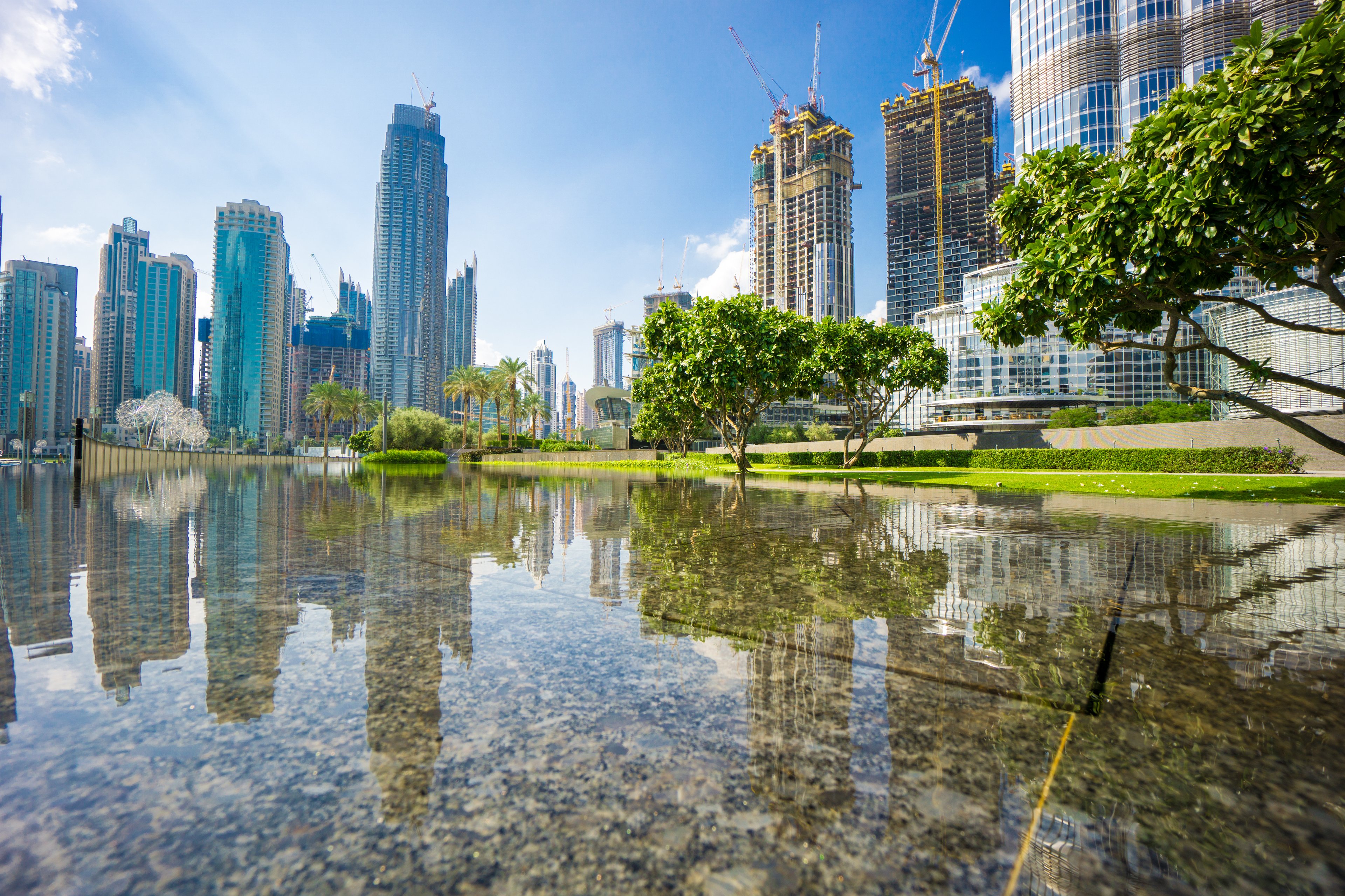 Relax at Burj Park with stunning views of the Burj Khalifa and skyscrapers