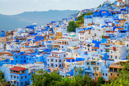 An aerial view of the blue houses of the city of Chefchaouen.