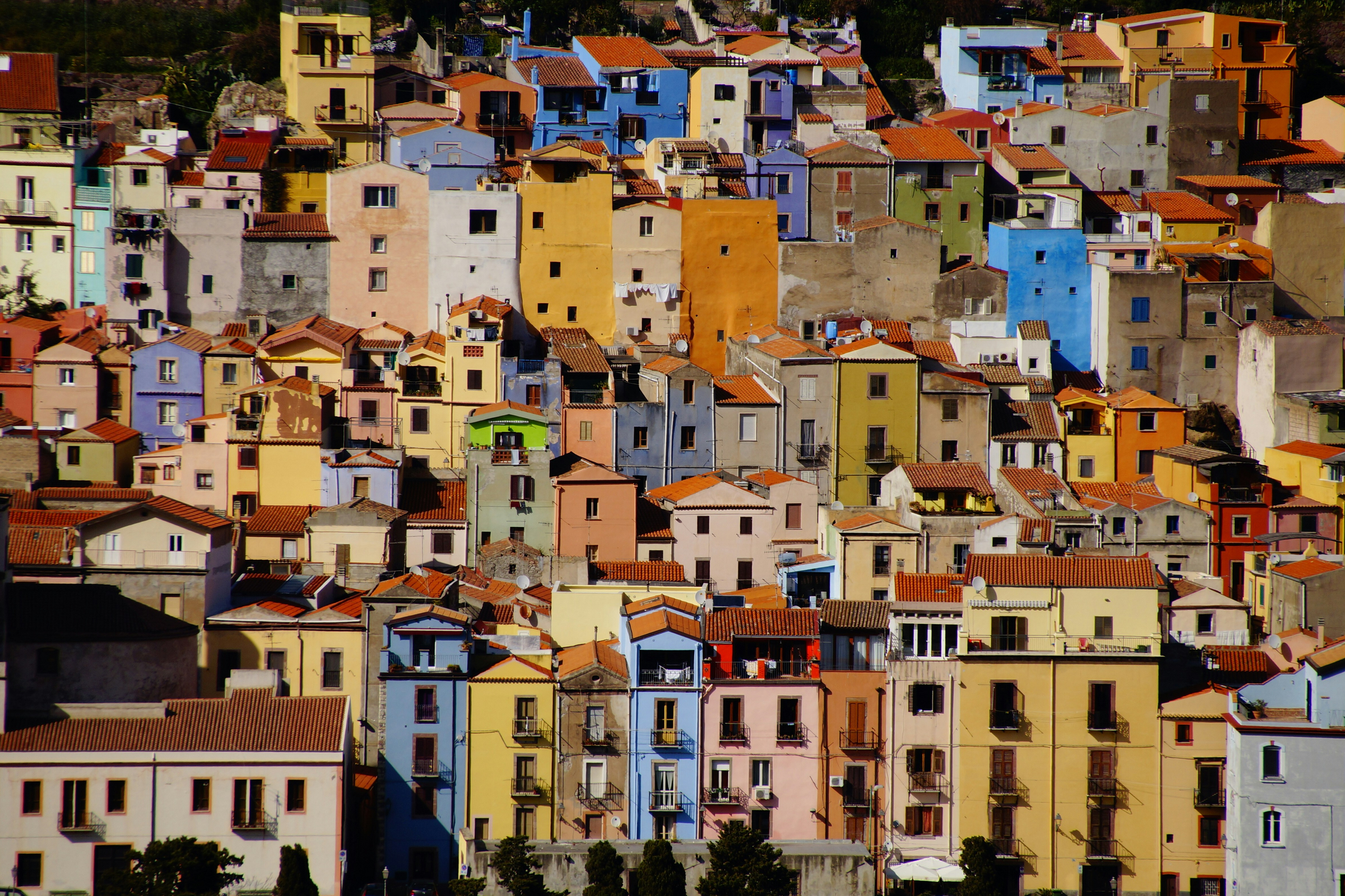 The vibrant hilltop houses of Bosa, one of Sardinia&rsquo;s most picturesque and peaceful medieval towns