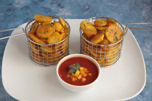 Crispy Kenyan Bhajia with chilli tomato sauce in Nairobi.