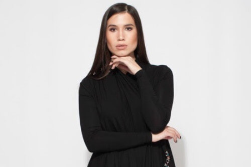 A model shows off the Nuuk Couture cardigan dress.