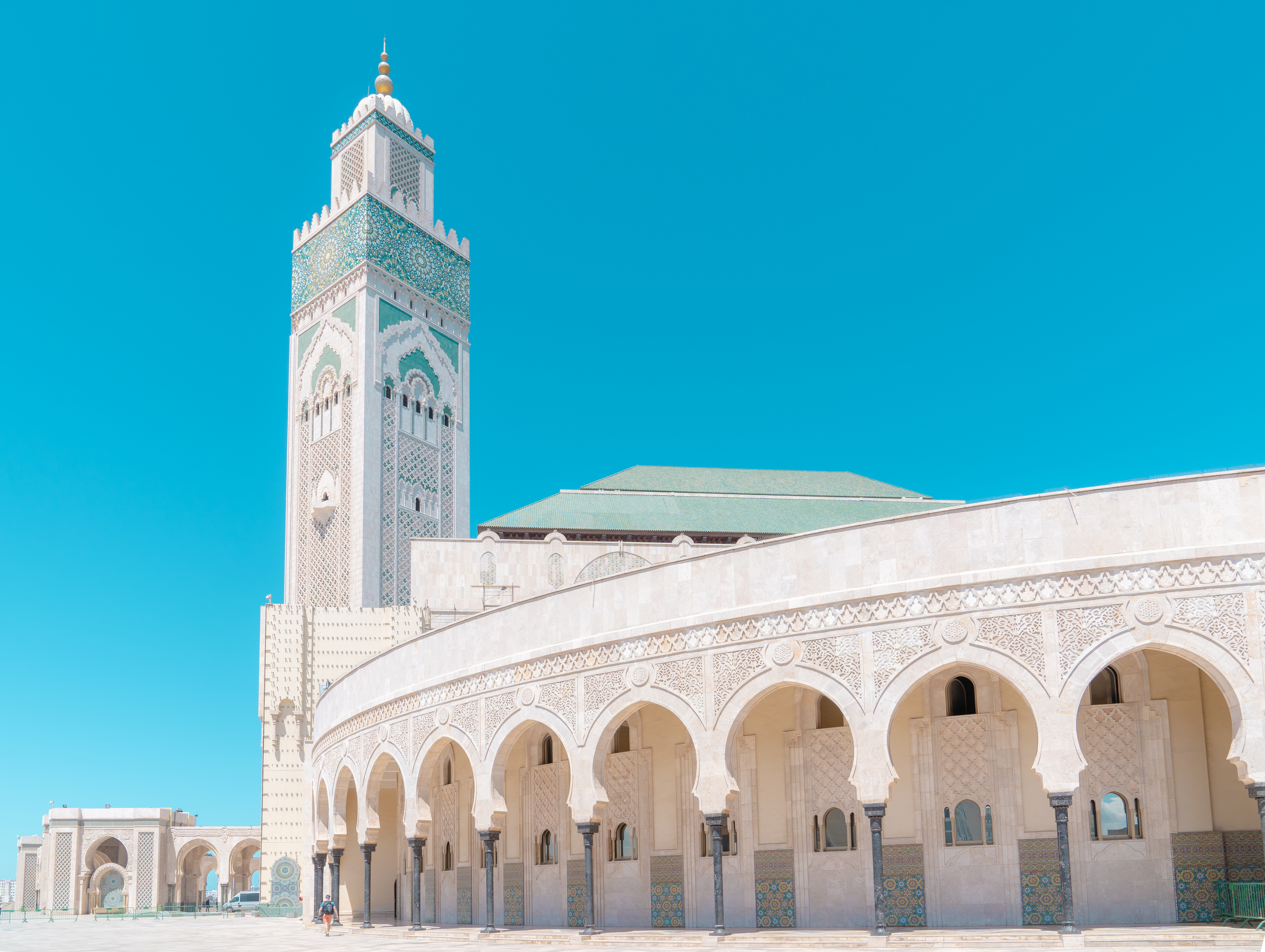 Hassan II Mosque in Casablanca with blue sky and ocean backdrop, a must-see Morocco attraction