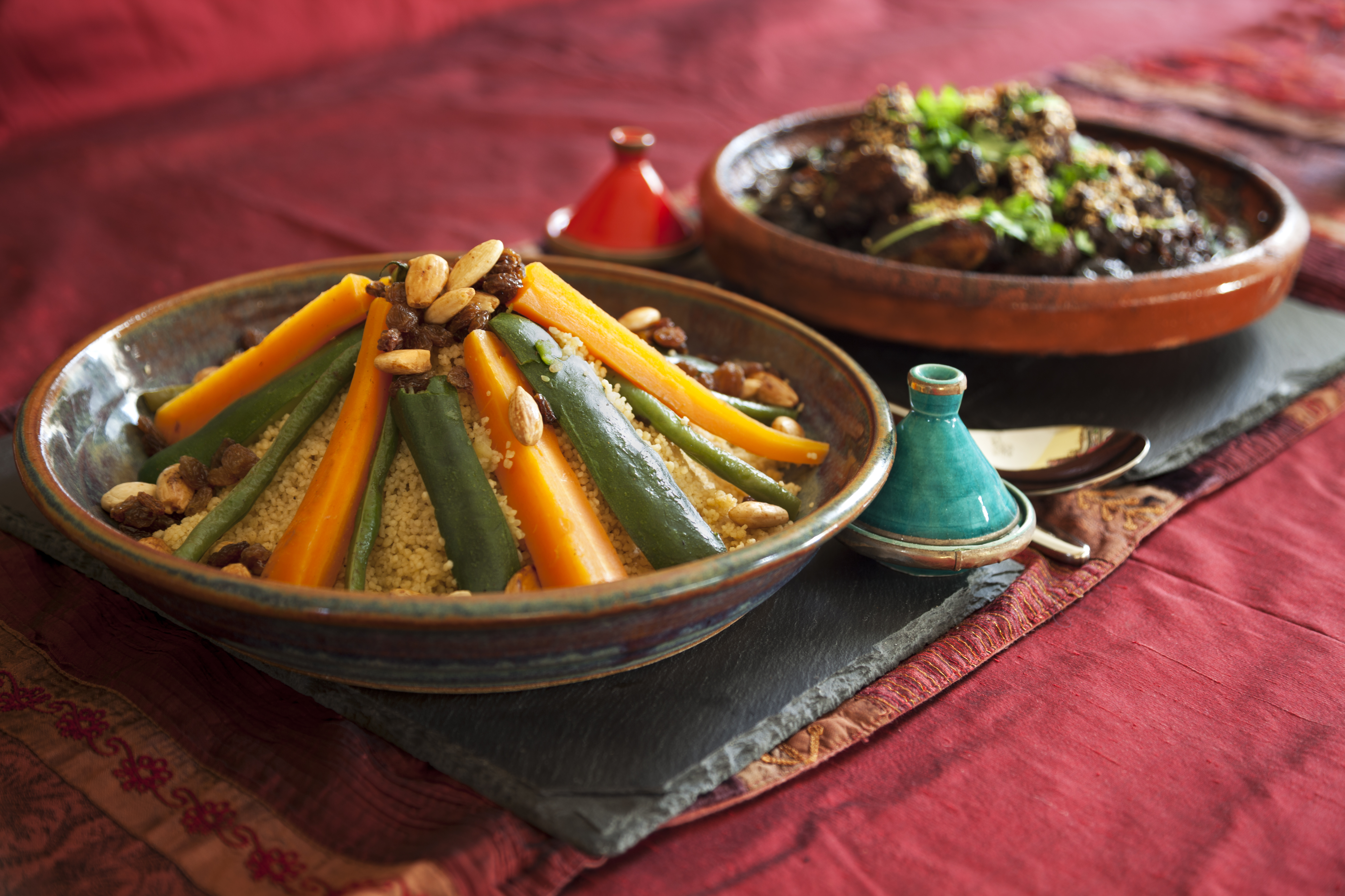 Traditional Moroccan tagine with vegetables and couscous, a staple of Moroccan food culture.
