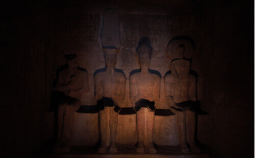 Carved statues inside the great temple of Ramses II in Abu Simbel, Egypt.
