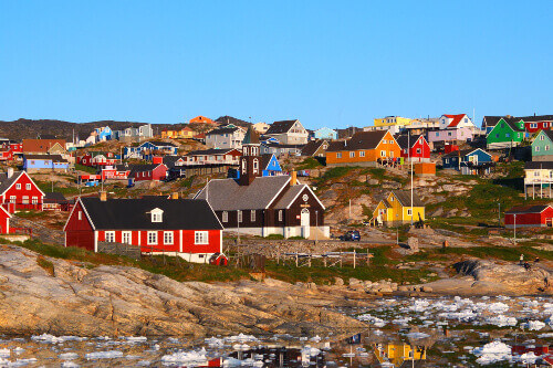 Ilulissat is the biggest island in the world, with Zion Church in the background.