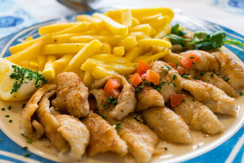 Filets de Perche en Frites at a restaurant in Lausanne.