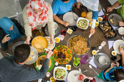 A family gathers to break their fast, or Iftar during Ramadan.