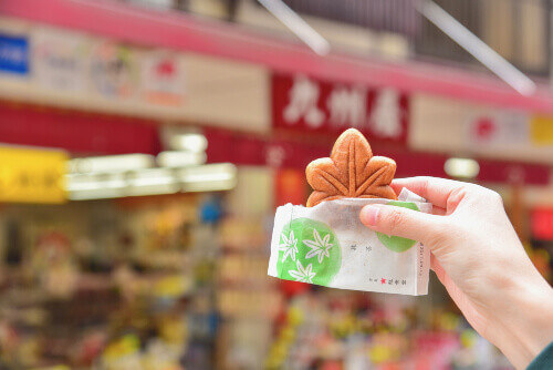 Visitors can enjoy a Green Tea Momiji Manju or Japanese-Style Sweet Cake Filled with green tea paste in Miyajima.