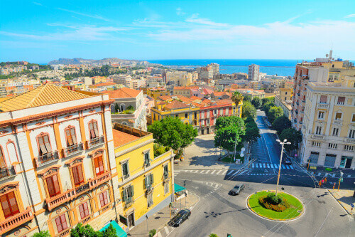 The Piazza Costituzione cityscape on a clear day.