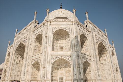 Tourists flock to the Taj Mahal each year to see the stunning marble facades.