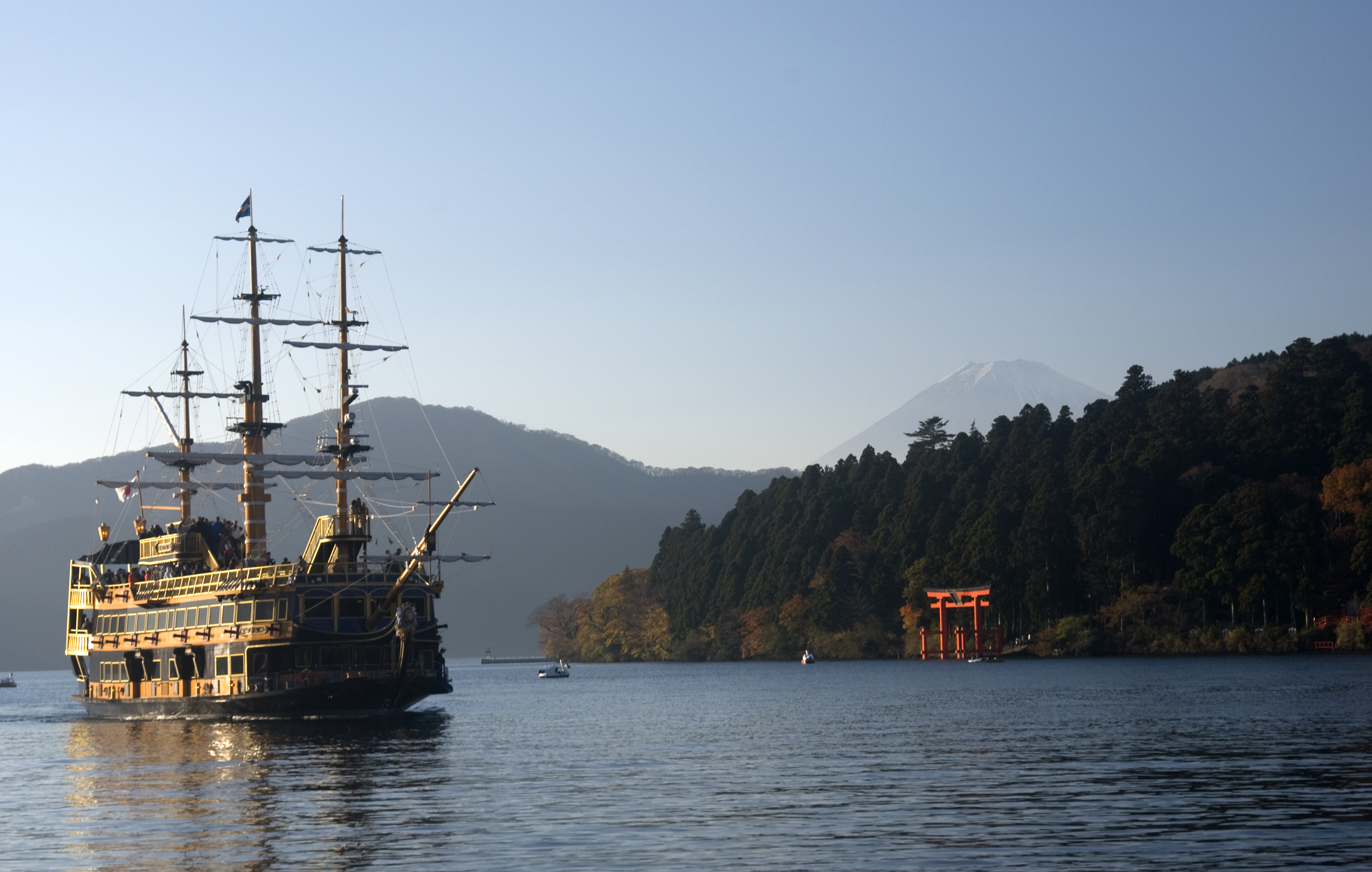 One of the most iconic Mount Fuji views is from Lake Ashi, where pirate ships add a playful contrast