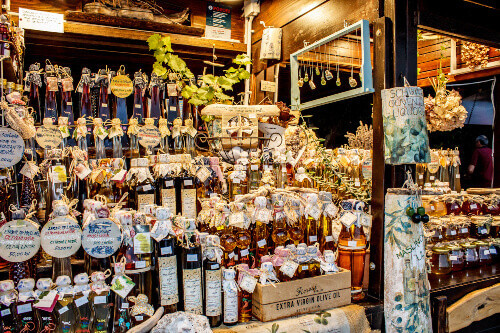 Olive oil and other local products at a market stall in Krk.