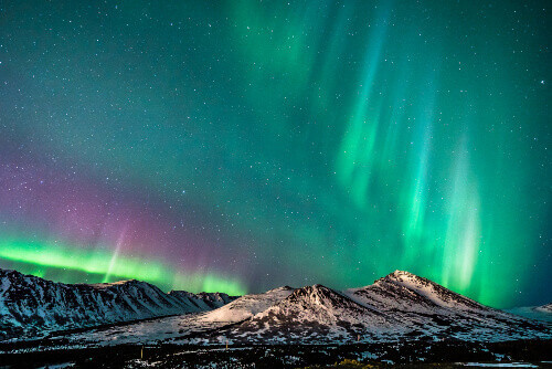 Northern lights over the Chugach Mountains in Anchorage.
