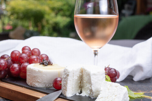 French soft cheeses, with variety of different tastes, served as a dessert with cold wine from Provence