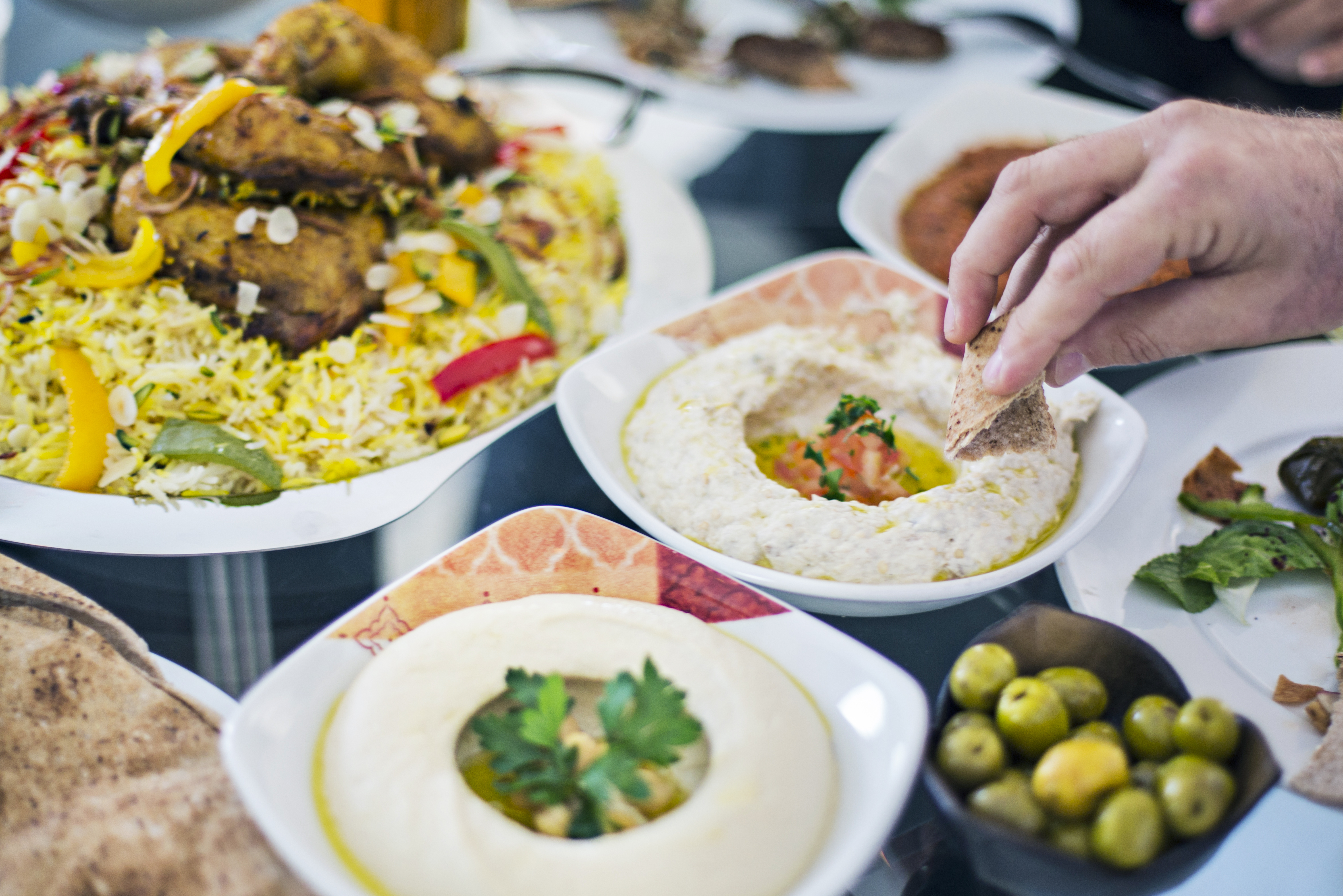 A spread of traditional mezze, perfect for experiencing Emirati and Middle Eastern flavors in Abu Dhabi