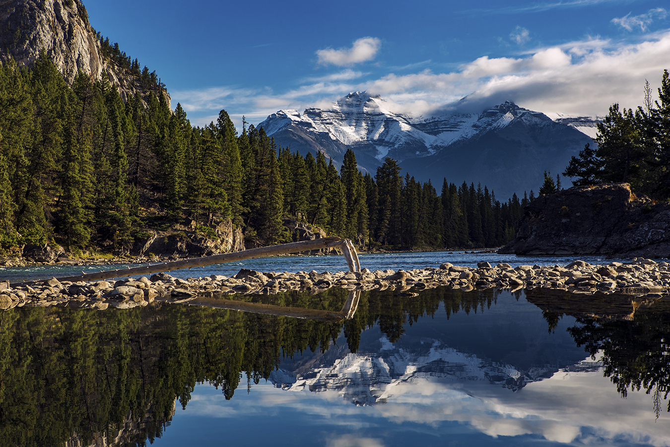 Bow River flows through Banff, offering a stunning backdrop to the surrounding landscape