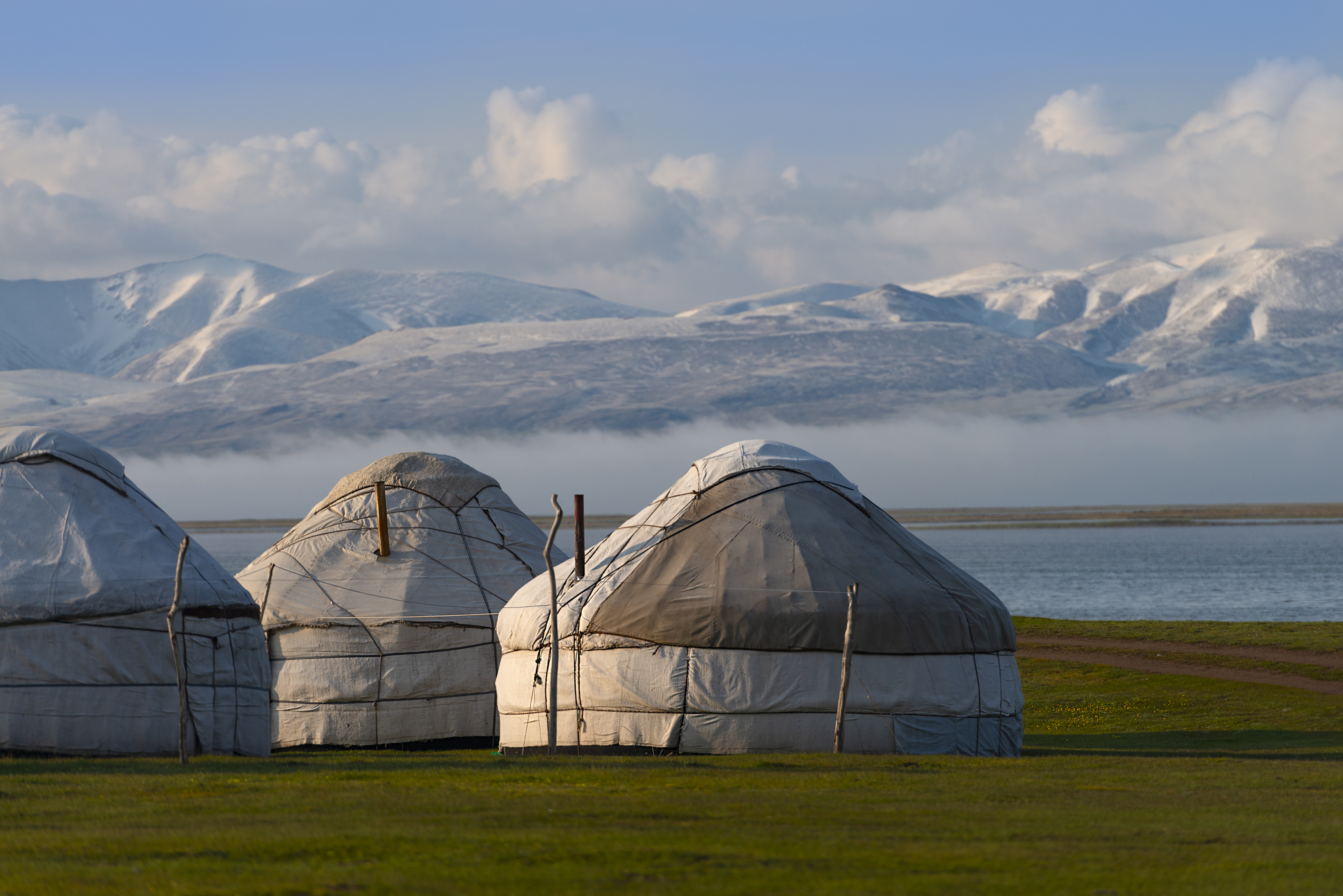 Traditional yurts at Song-Kol Lake, reflecting nomadic life in Kyrgyzstan