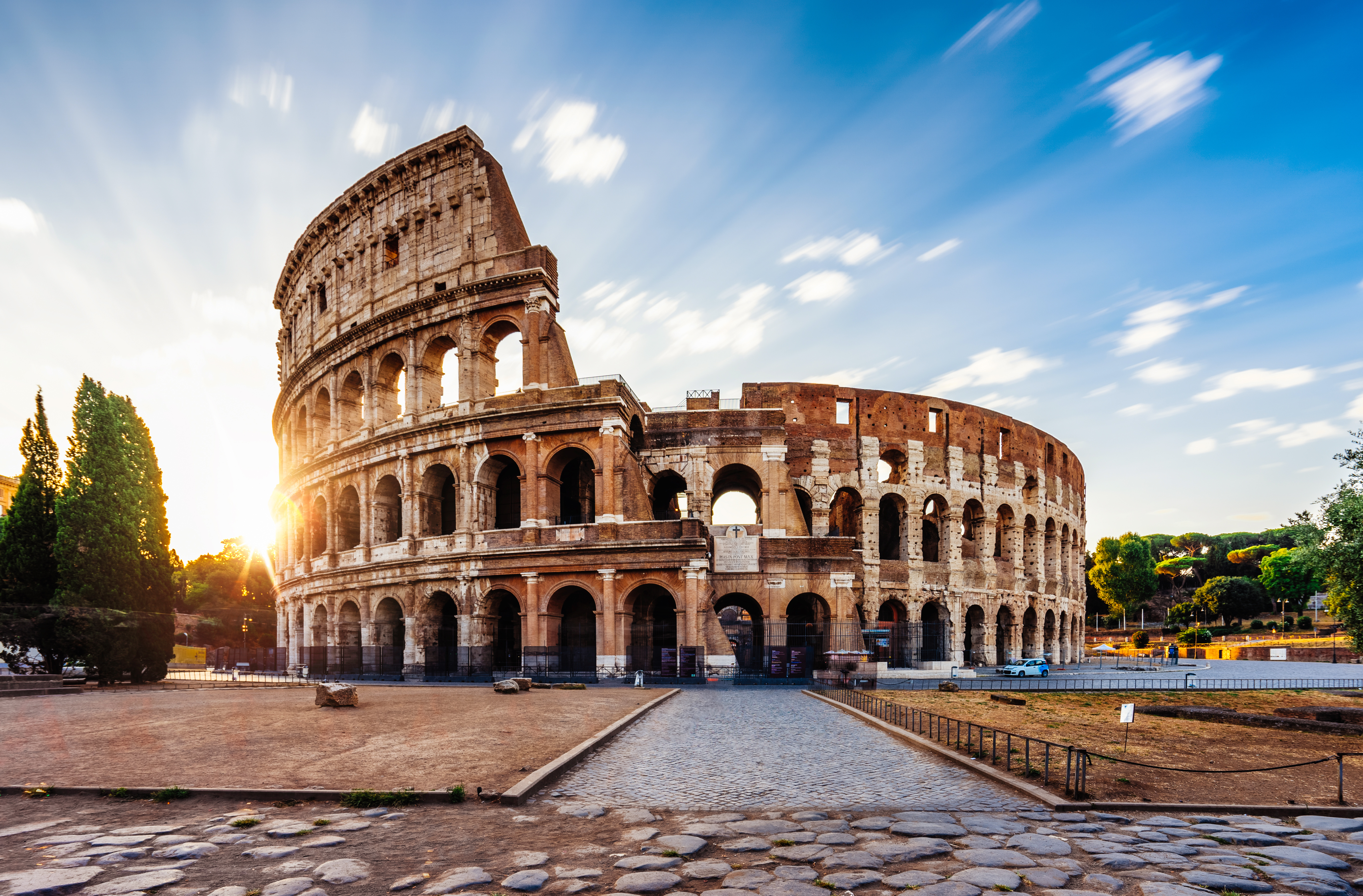 Begin your Italy travel experience at sunrise with a quiet moment at Rome&rsquo;s iconic Colosseum
