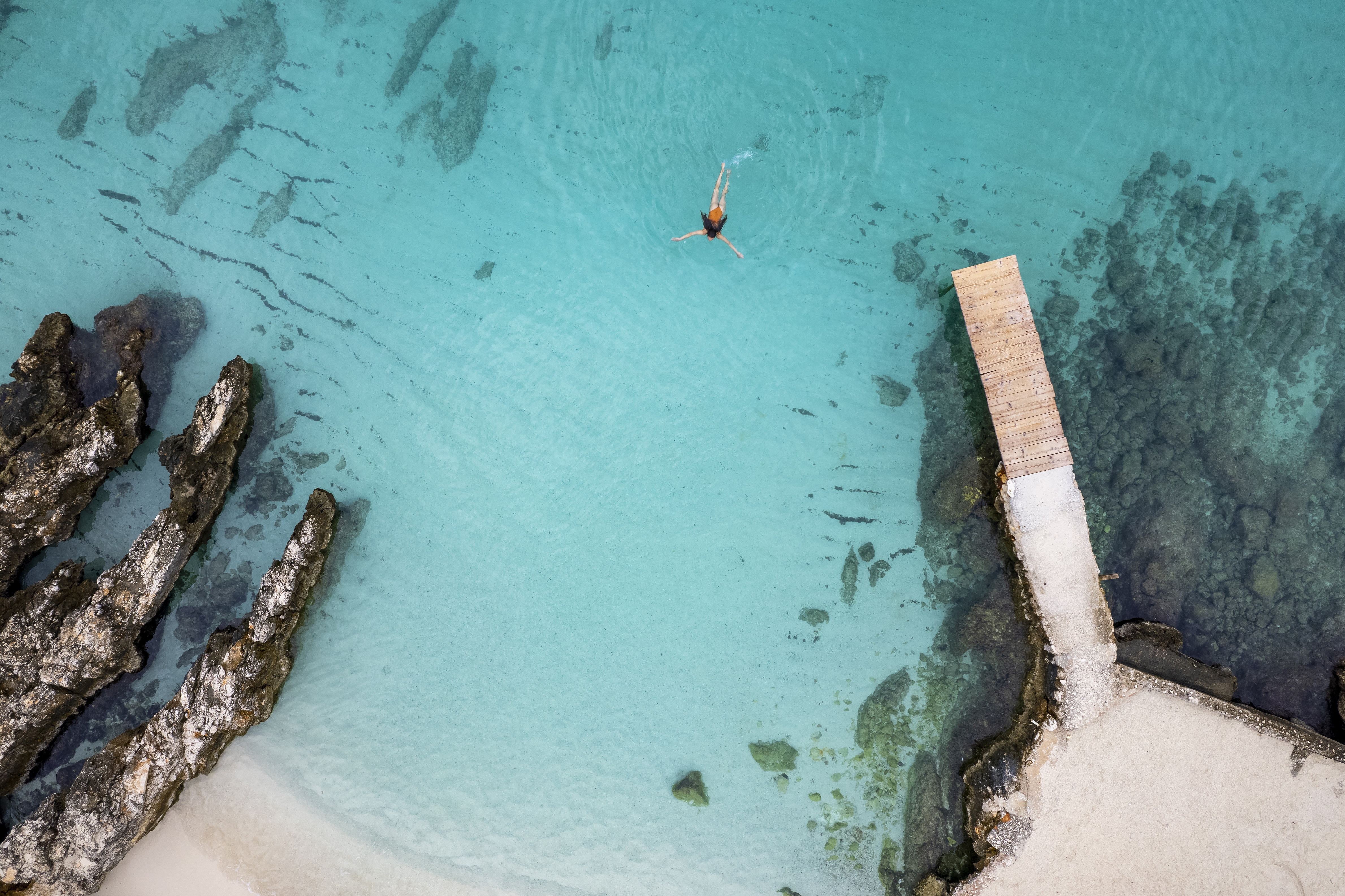 Snorkelling in the clear turquoise waters of Ksamil, on the Albanian Riviera.