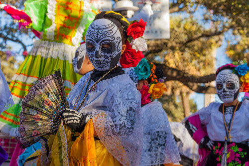 Women On The Dia De Los Muertos Celebration In Mexico