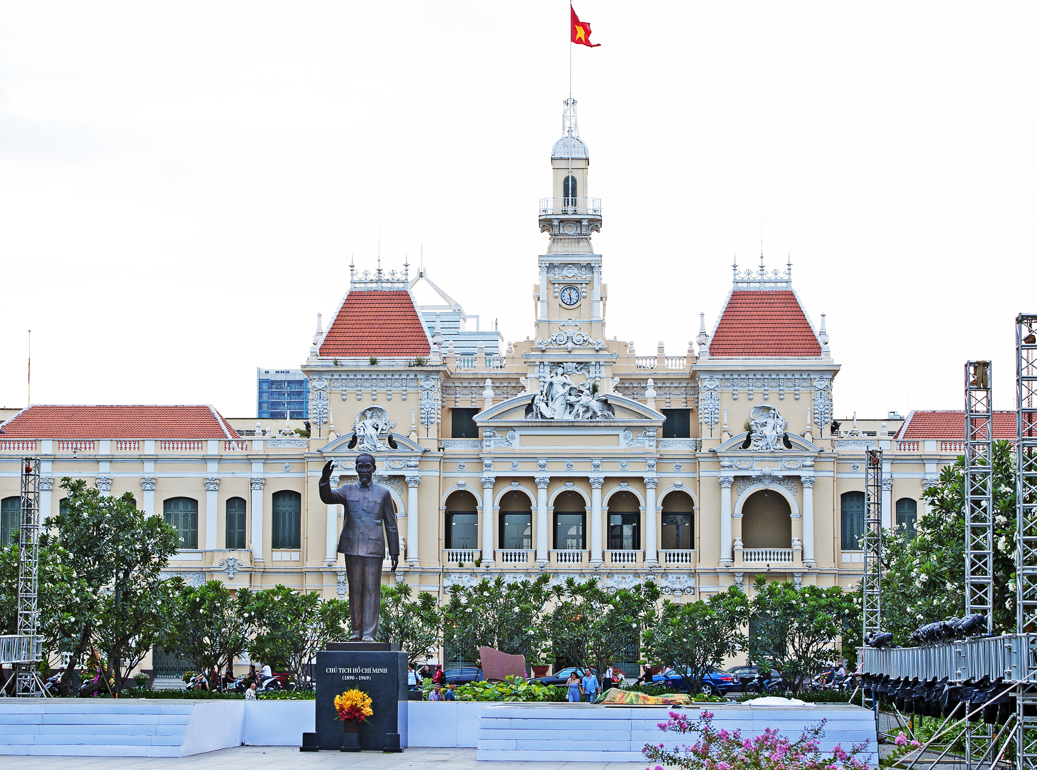 The statue of Ho Chi Minh stands proudly before the Grand City Hall