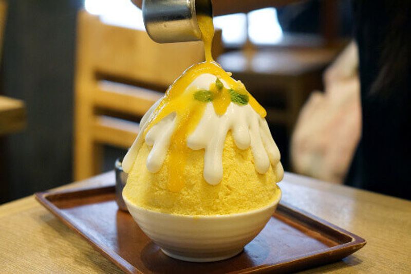 Mango Kakigori is a Japanese shaved ice dessert flavoured with coconut and mango.