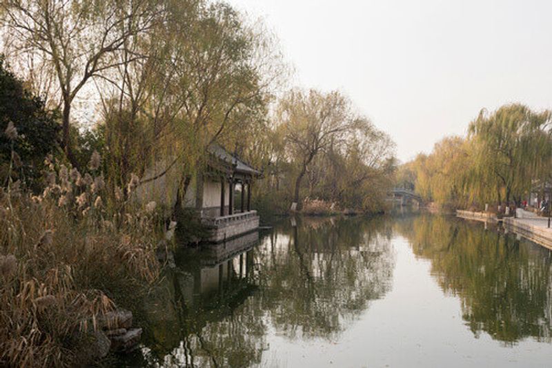 View of the river and bridge in autumn in Jinan, Shandong Province, China.