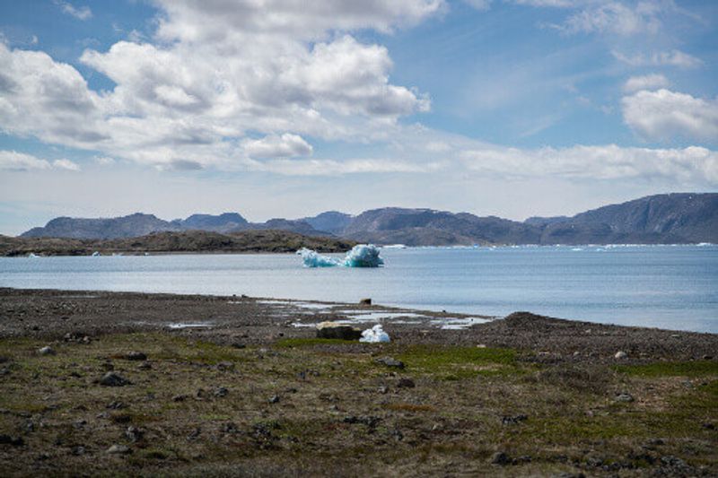 A melted iceberg floating in the coast of South Greenland.