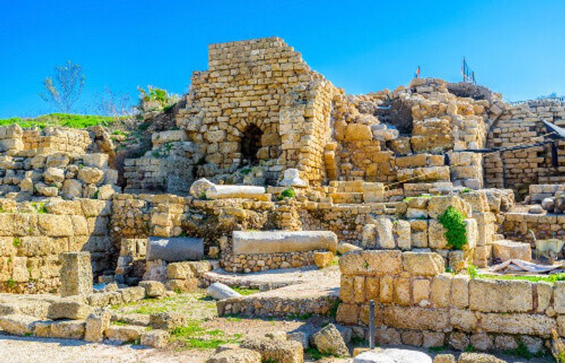 The Roman period stone ruins of the villas and city streets in Caesaria Maritima, Israel.
