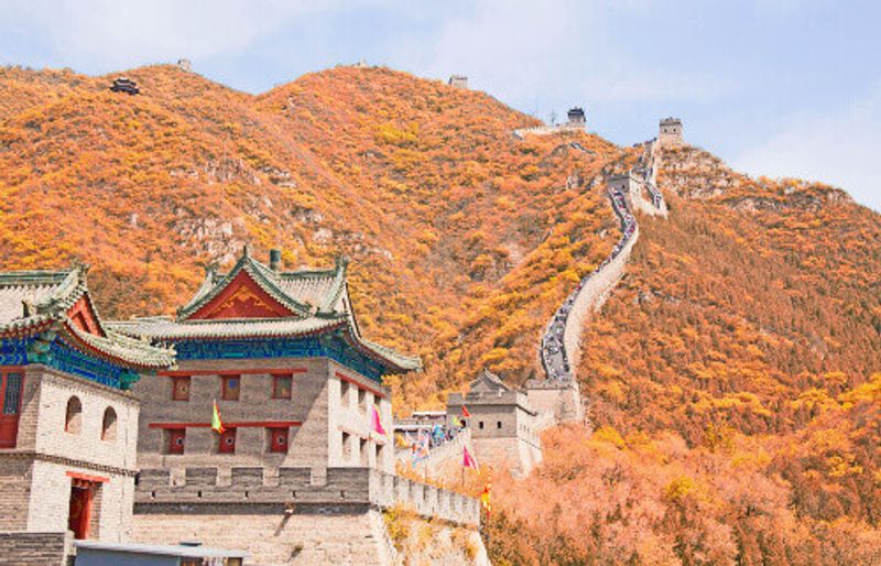 The colourful restored Great Wall of China facade in autumn.