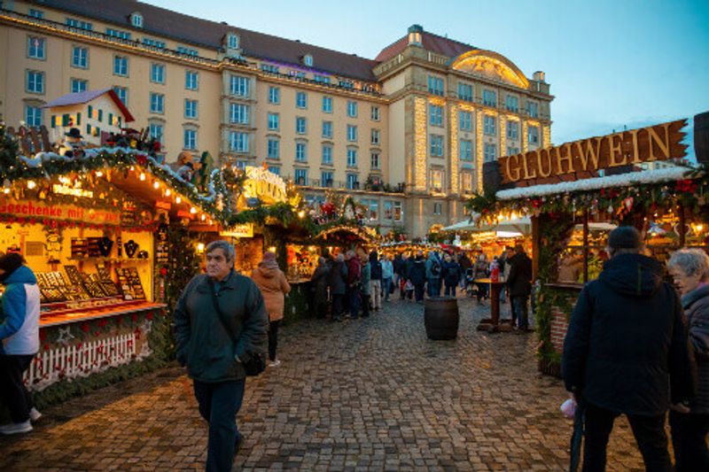 Visiting the Christmas market in Dresden.