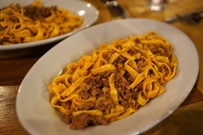 Tagliatelle Al Ragu, a Bolognese pasta with rich mince ragu and other seasonings in Bologna.