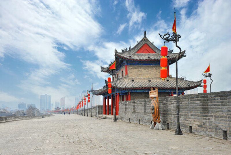 The city wall in Xi'an boasts a traditional ancient tower.