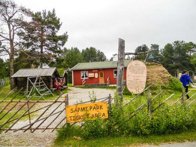 A sign outside a fence in Sapmi Park, Karasjok, Norway.