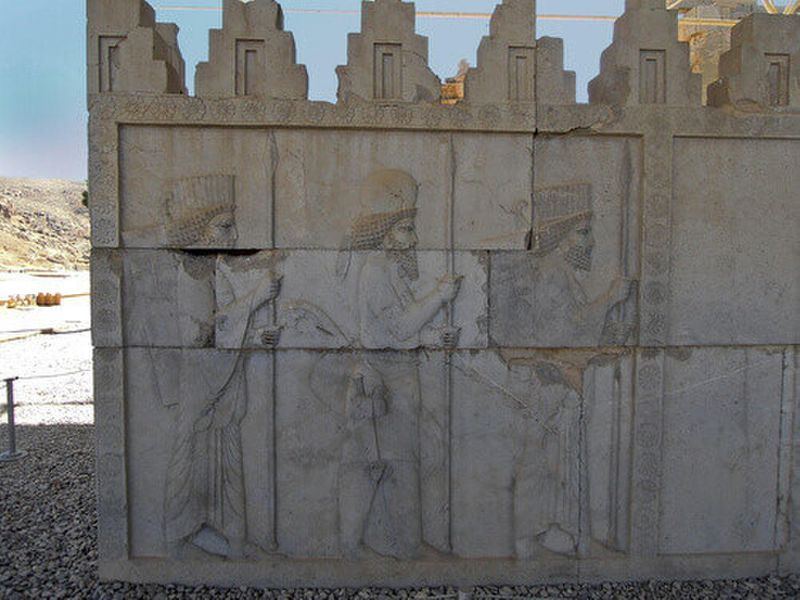 Reliefs of marching Median and Persian guardians decorating the walls of royal palace Apadana in Persepolis