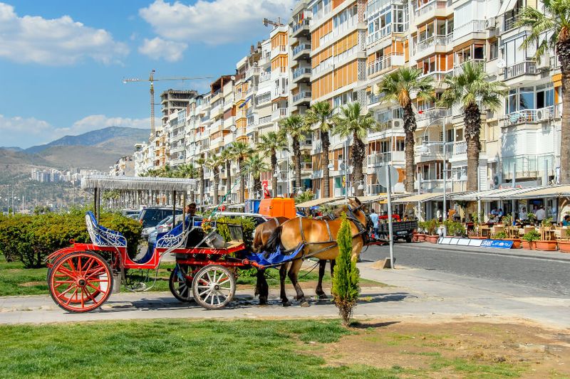 A coachman with phaeton and horses in Izmirs Kordon