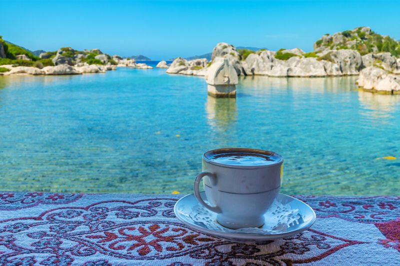 Enjoying a refreshing Turkish coffee on the coast of Kekova Bay.