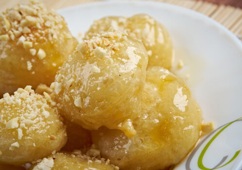 Loukoumades, or greek style donuts with honey and nuts.