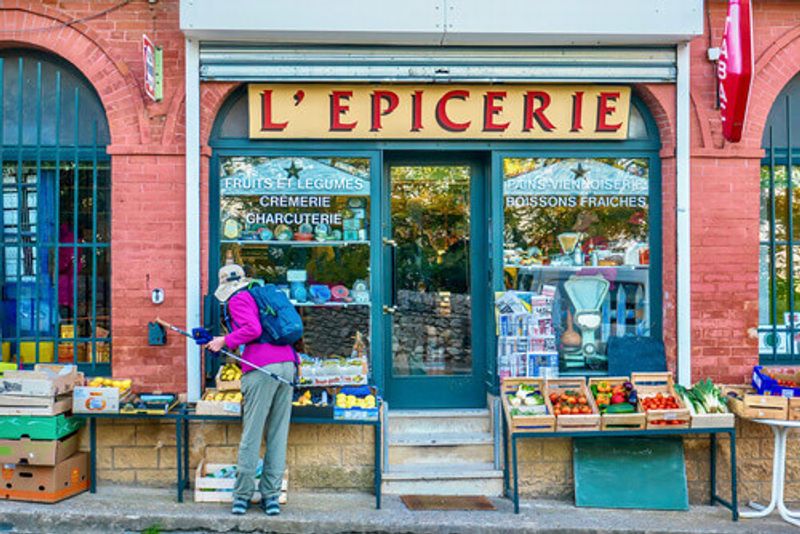 A grocery shop in Gigondas, France, where a tourist shops.