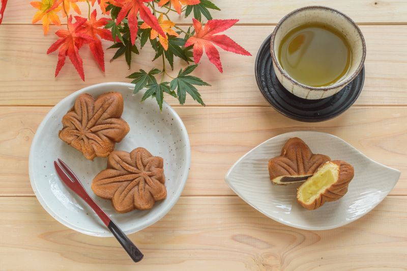 Momiji manju, a popular Hiroshima souvenir, is a small, maple-leaf-shaped cake filled with mashed sweet bean paste.
