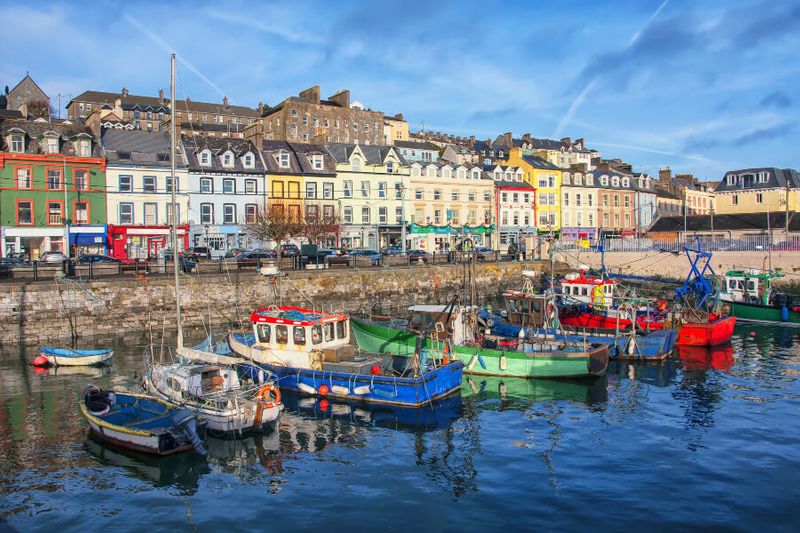 The Port of Cobh with colourful houses and boats.