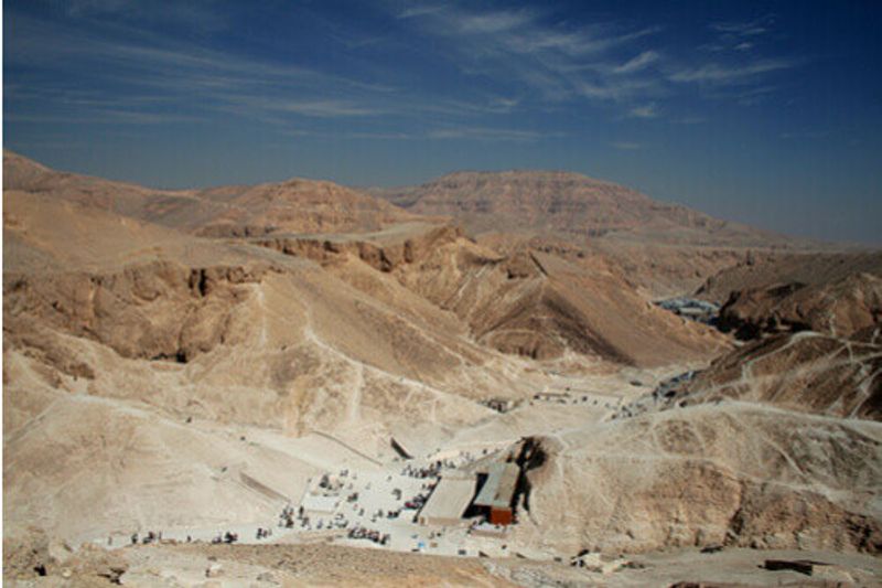 People look around in the Valley of the Kings in Egypt.