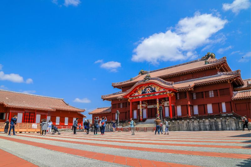 The UNESCO World Heritage site of Shuri Castle with many tourists visiting the castle.