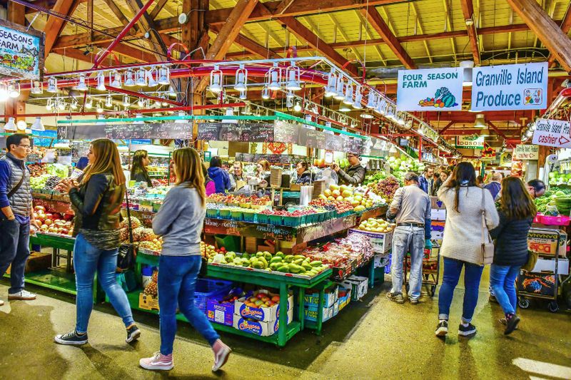 Customers browse in the Granville Island Public Market.