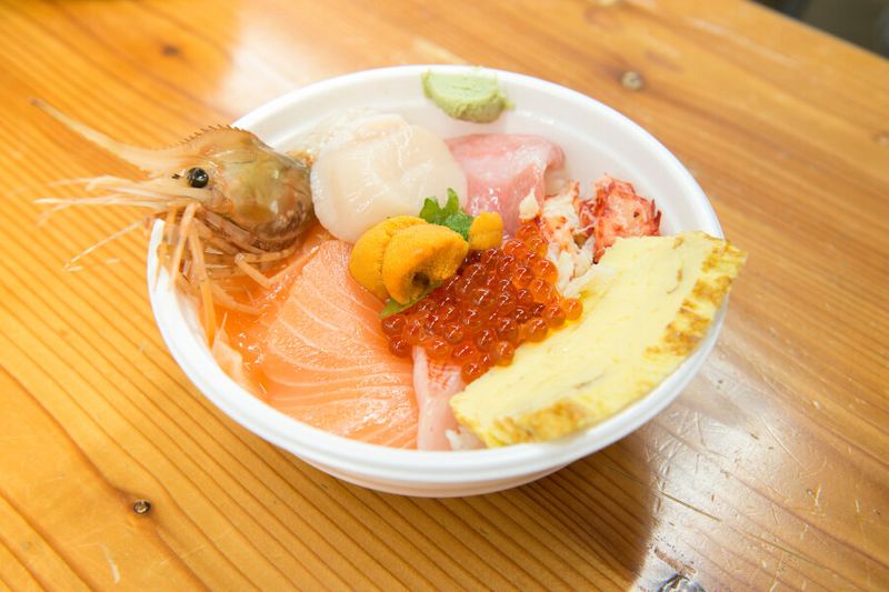 Katte Don bowl made out of different seafoods with rice being sold at Kushiro Washo Market.