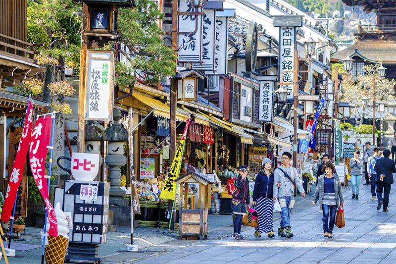 Nakamise Street near the Zenko-ji Temple lined with shops selling souvenirs.