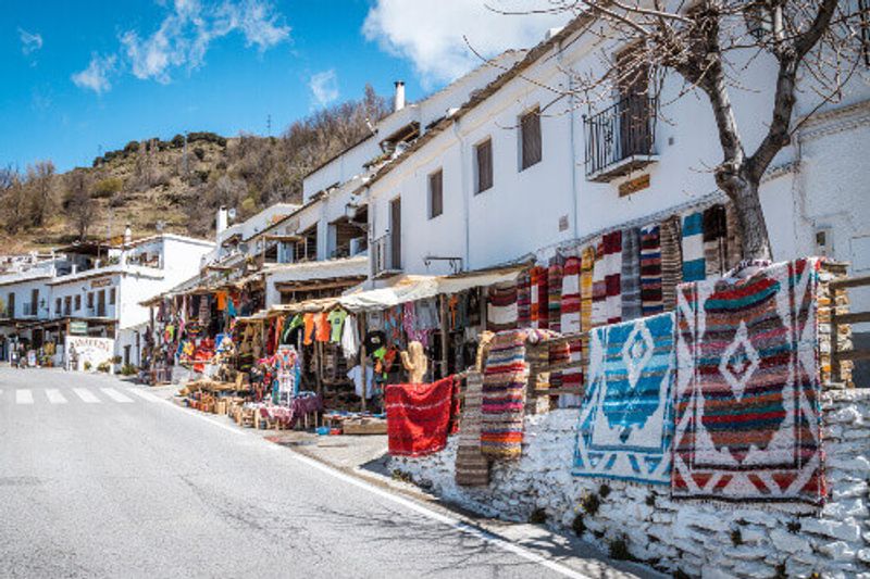 The town of Capileira in Ajpujjaras features quaint street markets, selling different wares.